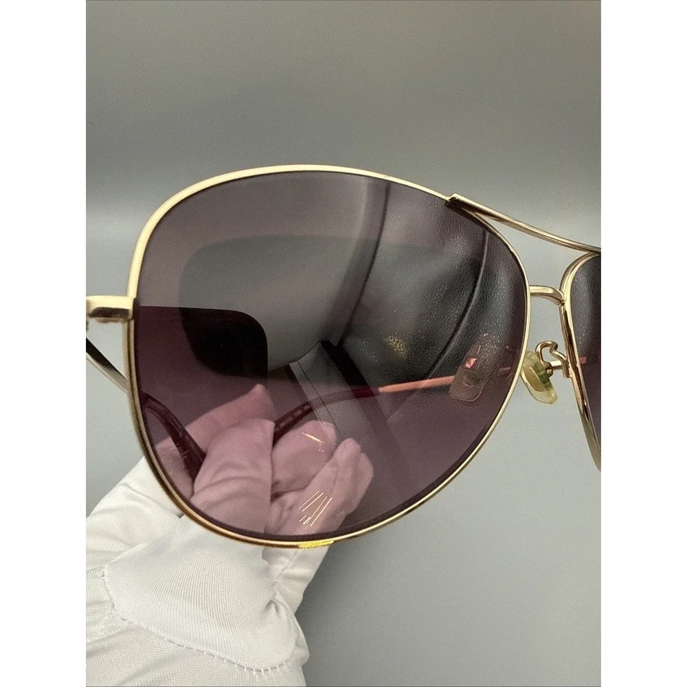 Coach gold aviator